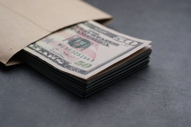 Pexels - Stack of dollar bills