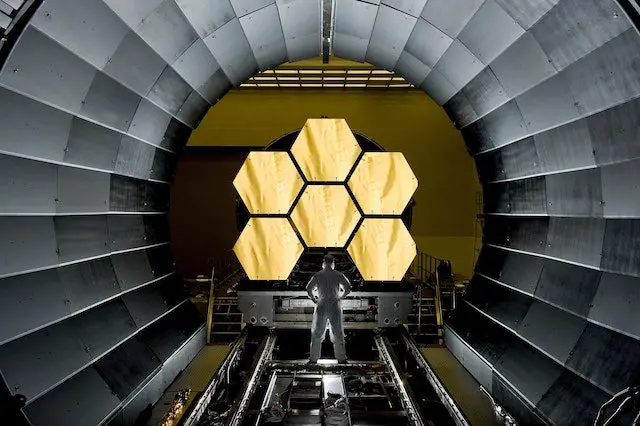 Man Standing on Stainless Steel Filamend