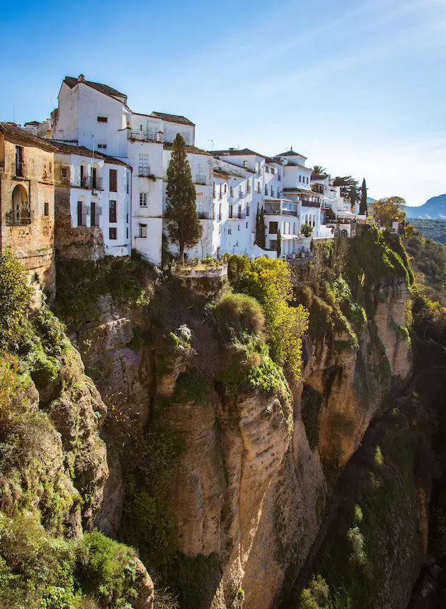 https://www.pexels.com/photo/white-concrete-buildings-next-to-a-cliff-1703311/