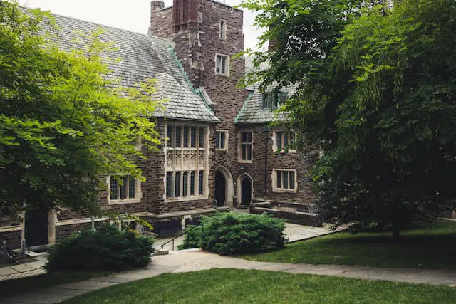 facade of the princeton university building with grass and trees in the front princeton new jersey usa