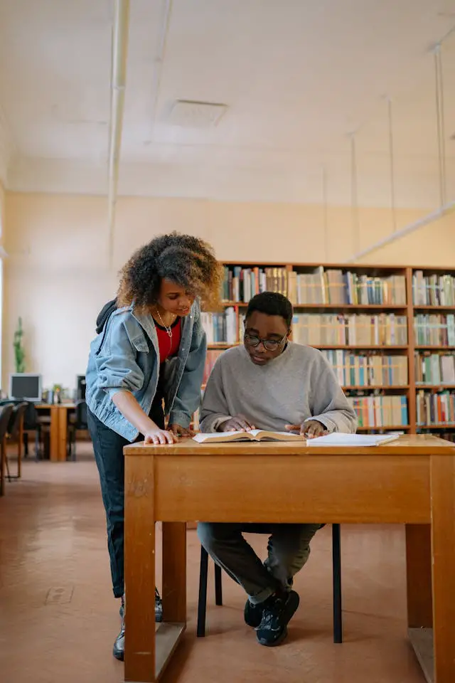 man and woman inside the library