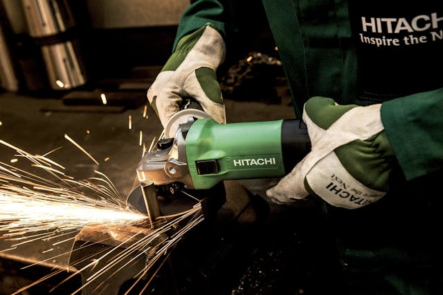 person operating hitachi angle grinder