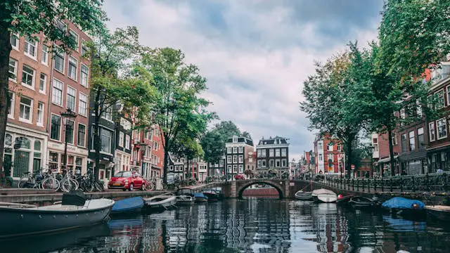 photo of boats parked on river