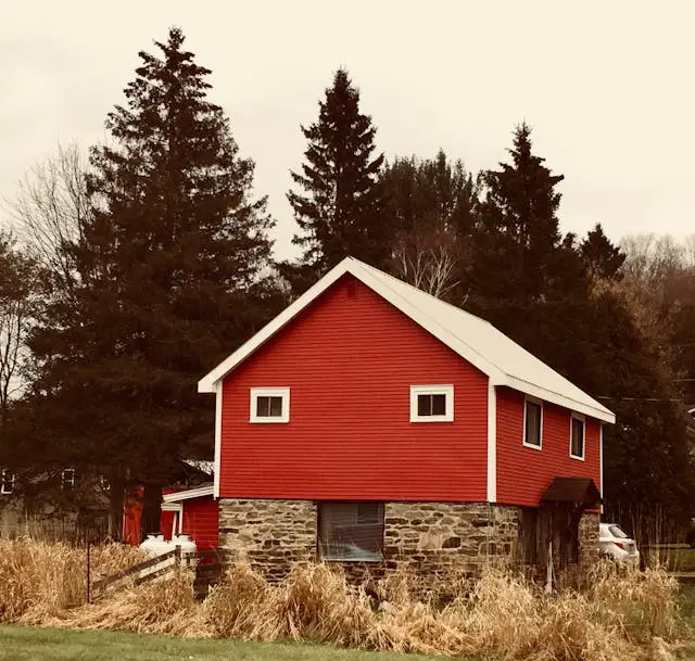 red brown and white wooden and brick house