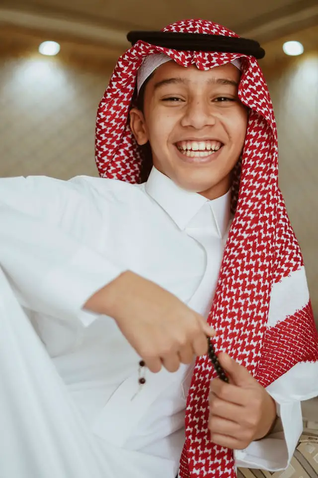 smiling boy in traditional clothing