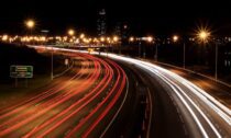 time lapse photography of cars on the road during night time