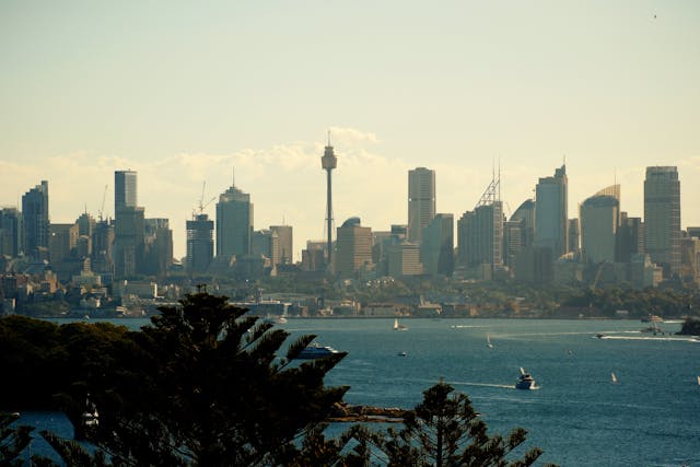 bay full of ships and boats off the coast of sydney