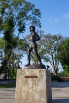 indigenous warrior statue in curitiba park