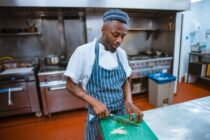 man cooking in kitchen