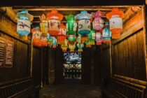 photo of assorted color chinese lanterns inside room