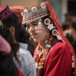 group of people with headdresses