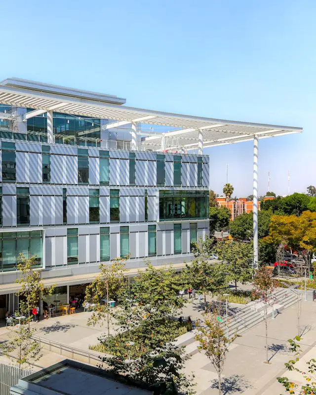 a building with a large glass roof and a courtyard