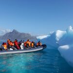 iceberg ice greenland tourism boat