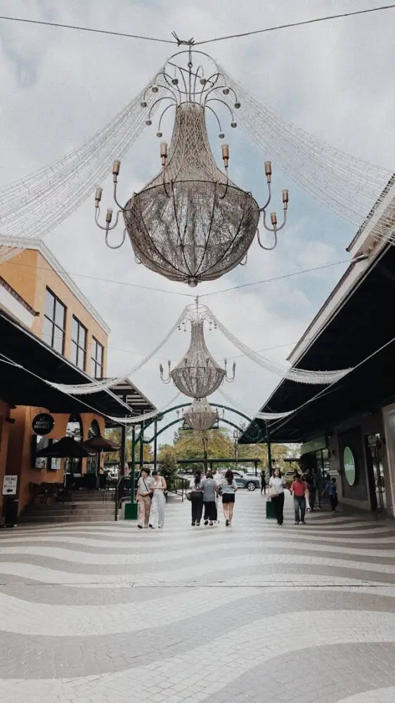 outdoor mall with decorative chandeliers