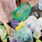 a person sorting plastic wastes