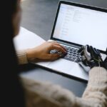 a woman using a laptop