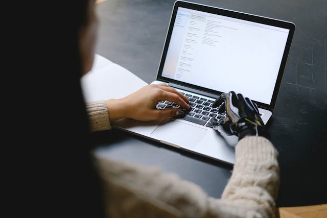 a woman using a laptop