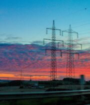 electricity poles during sunset