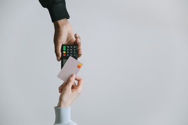 person holding white and black smartphone