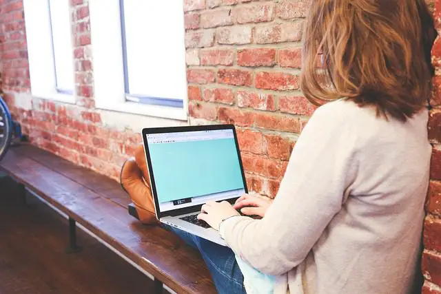 student typing keyboard text woman