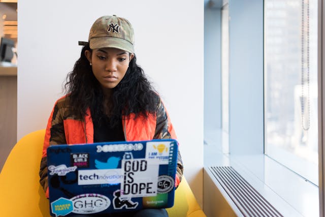 woman using laptop computer