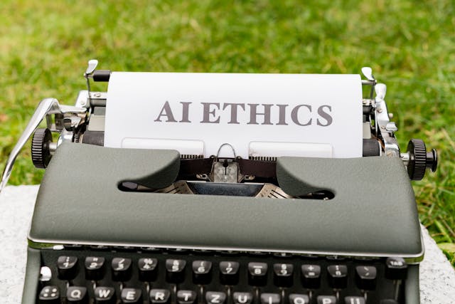 a typewriter with the word ethics on it